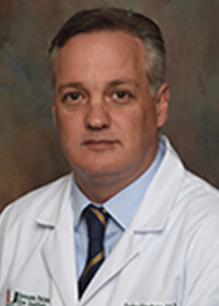 Carlos E. Mendoza, MD