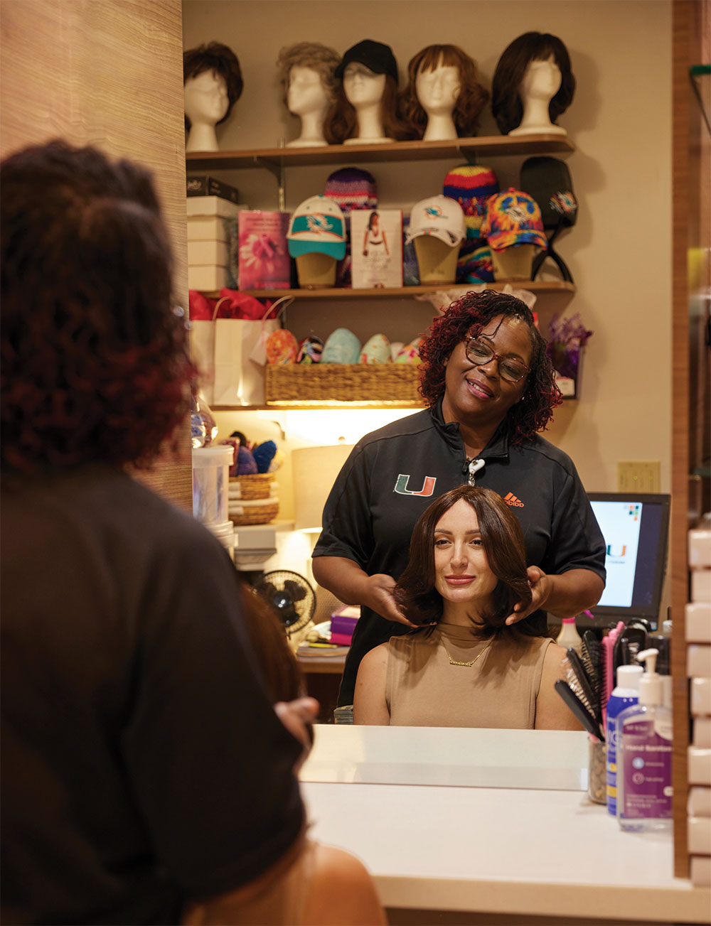 Woman trying on a wig