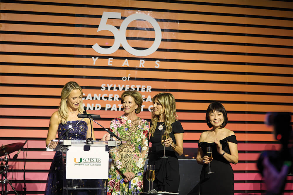 Several women accepting an award at a Sylvester Gala