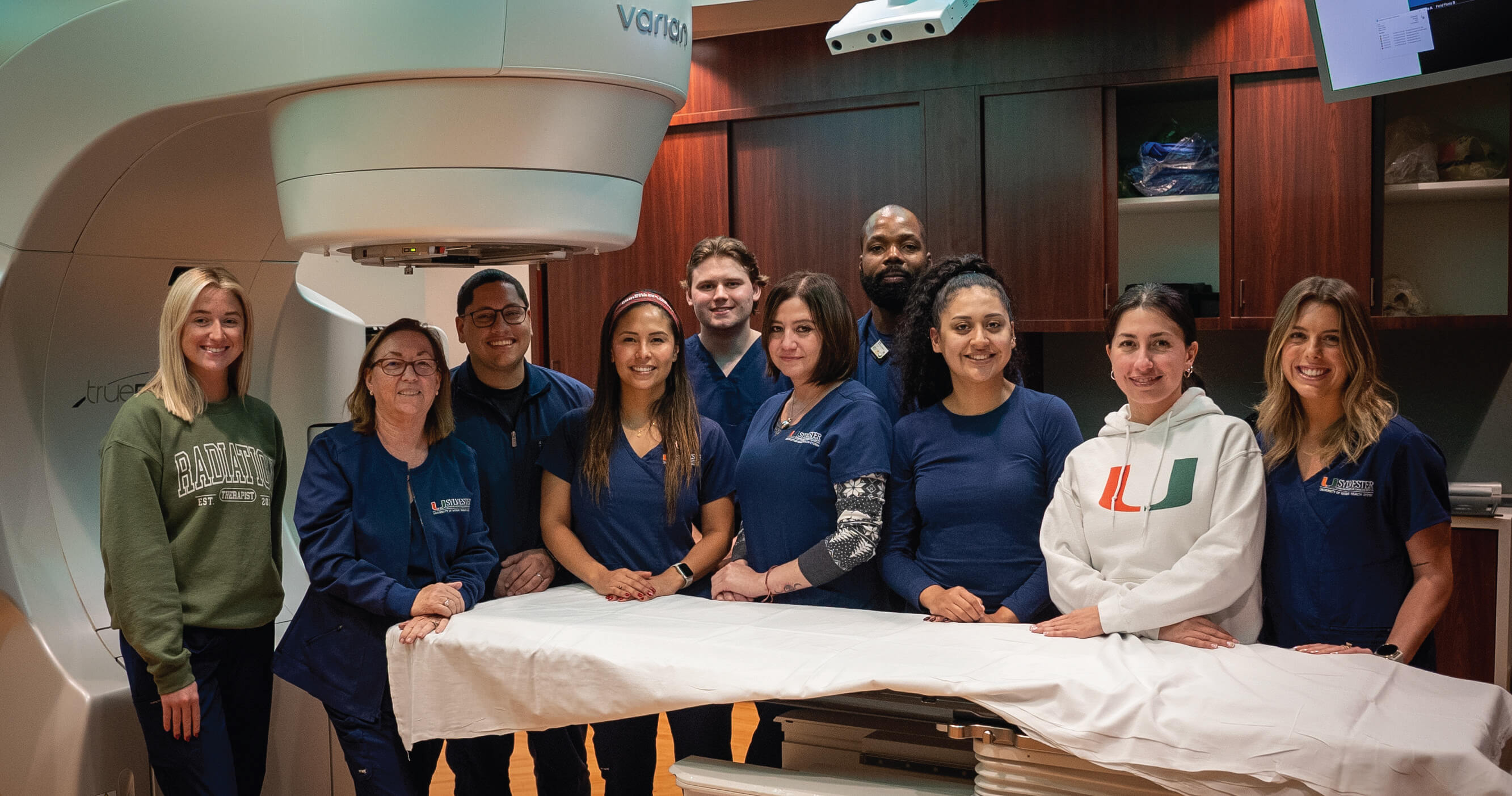 Members of Sylvester's Radiation Therapy Team (from left): Jessica Law, Catherine LeDroux, Gerardo Sanchez, Monica Martinez, Brandon Kerby, Xaviera Martin, Michelait Pierre, Sharlyn Montoya, Lina Botero and Ashley Braam