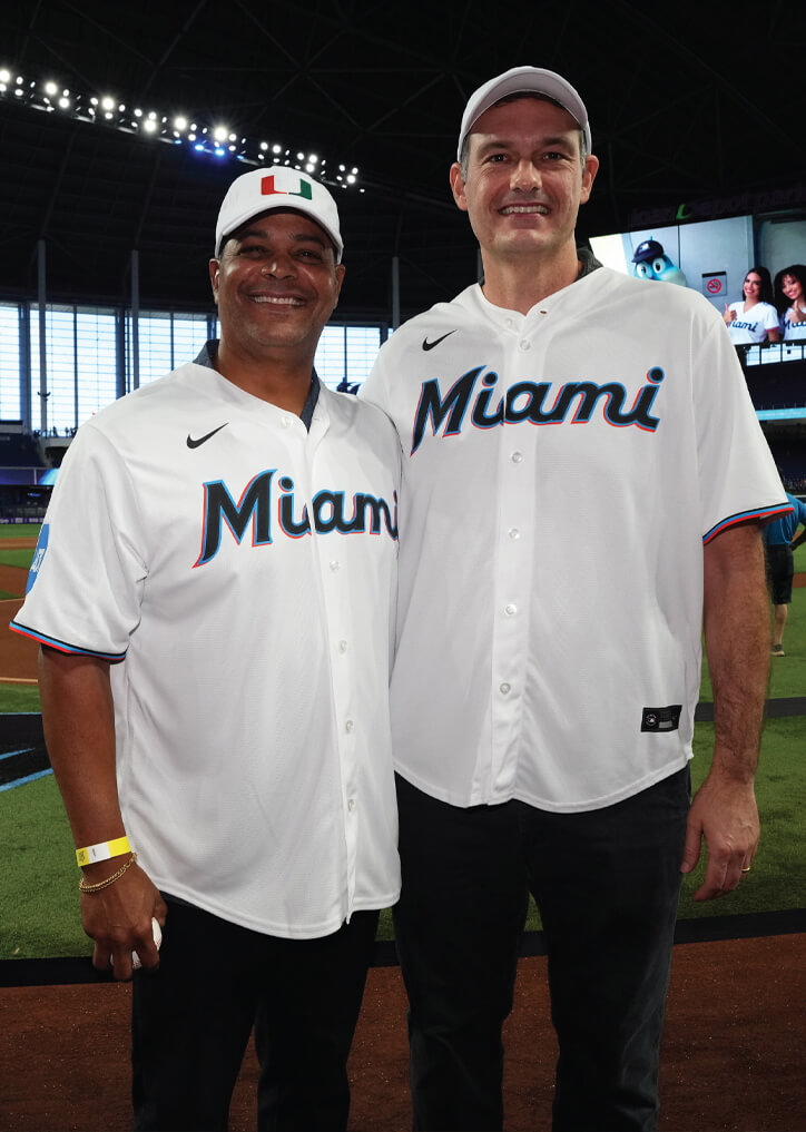 Sylvester patient Mervyl Melendez threw the first pitch at a Marlins game and posed with his doctor, Alan Dal Pra, M.D., medical director of radiation oncology.