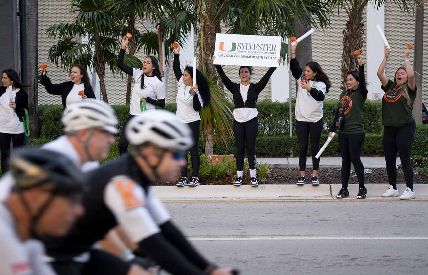 Crowd cheering on bike riders at DCC