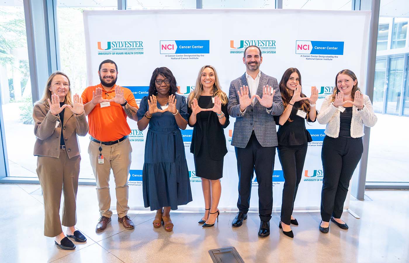 Left to right: Cathy Ireland, Coordinator, Facilities & Operations; Alex Hernandez, Sr. Administrative Assistant; Valentine Cesar, Outreach Specialist; Lauren Whitmore, Assistant Vice President and Associate Director, Research Administration; Jorge Vazquez, Executive Director, Cancer Center Operations; Silvia Garcia, Sr. Project Manager; and Sherilyn Gould, Project Manager