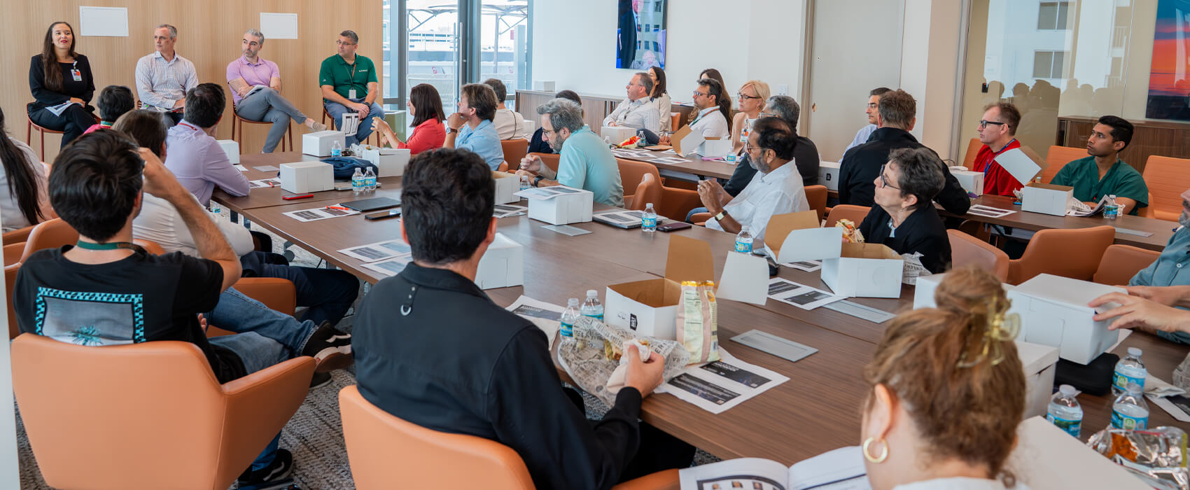 Attendees of the Sylvester Innovates Lunch and learn sitting and listening to speakers