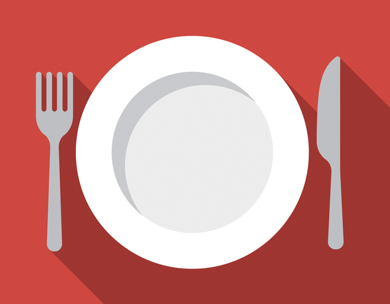 Icon of a plate, knife and fork on tope of a red background