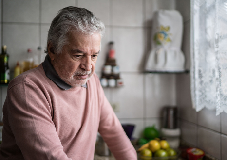 Hispanic Male standing in a kitchen