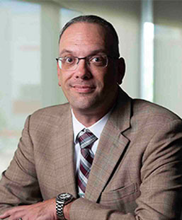 David W. Reis, Ph.D.