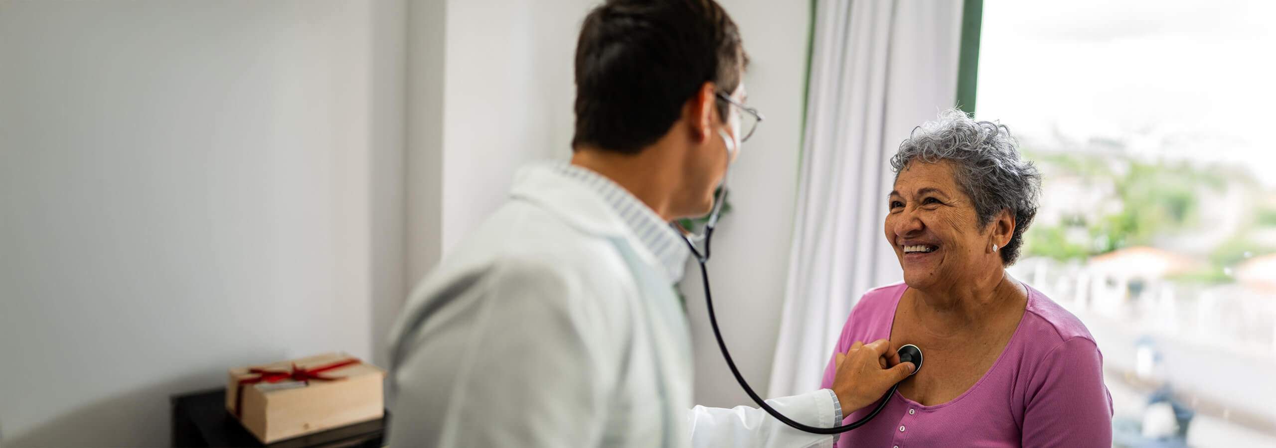 Male patient treating an older female patient