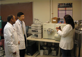 A proteomic ion trap mass spectrometer in the laboratory being used for identification of proteins by mass spectrometric protein sequencing.