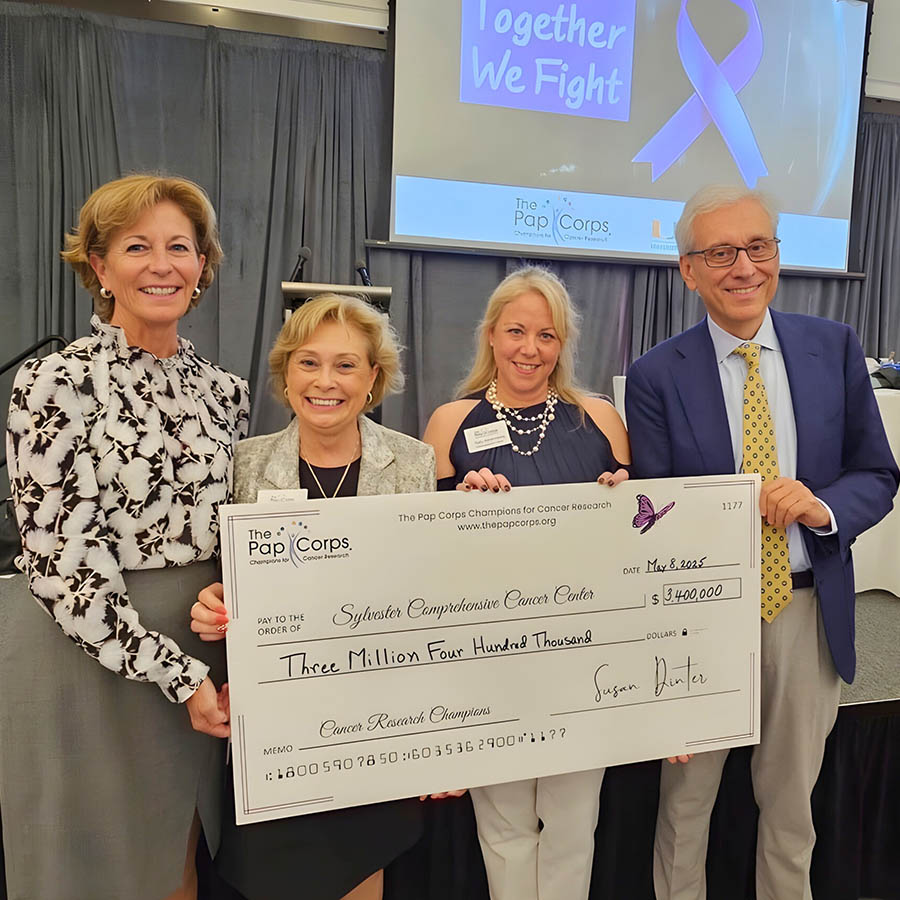 From left: Jayne S. Malfitano, chair of the Sylvester Board of Governors; Susan Dinter, chair of The Pap Corps board of directors Sally Berenzweig, CEO of The Pap Corps; and Antonio Iavarone, M.D., deputy director of Sylvester. 