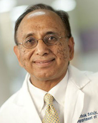 Dr. Ashok Saluja