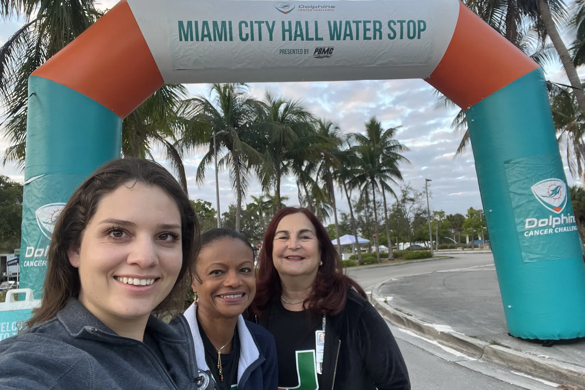 Nurses take a group shot at the water station at DCC