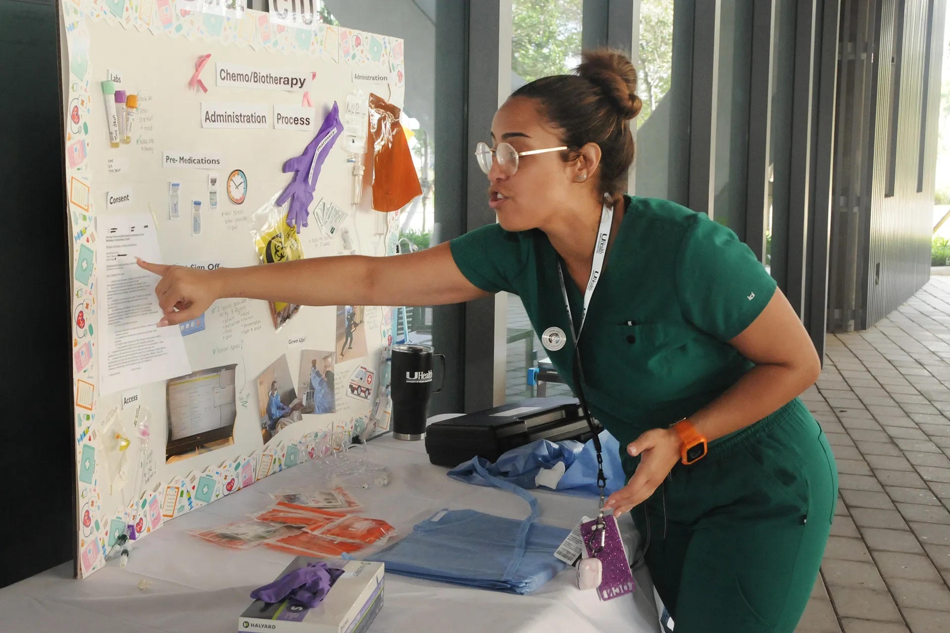 Nurse showcase PPE at an event