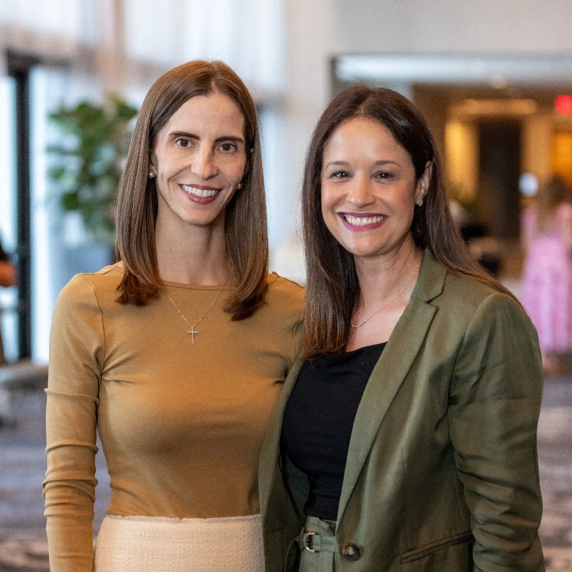 Two Nurses pose for a photo